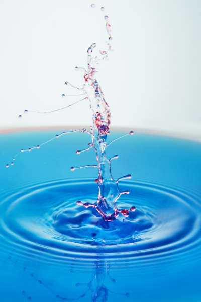 Abstract background of splash of color water, collision of colored drops, the concept art with abstract effect Water Well Fracturing Truck